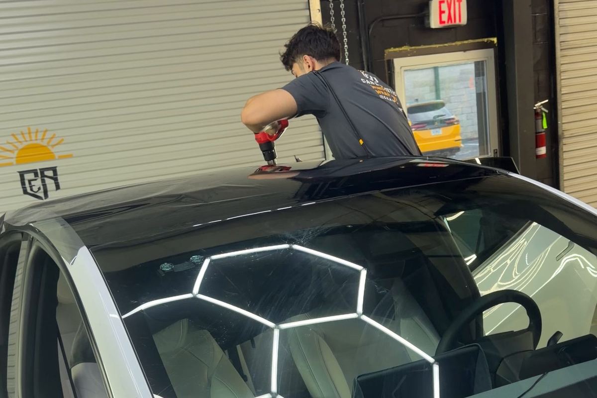Tinting a Tesla Model Y at CEA in Orlando