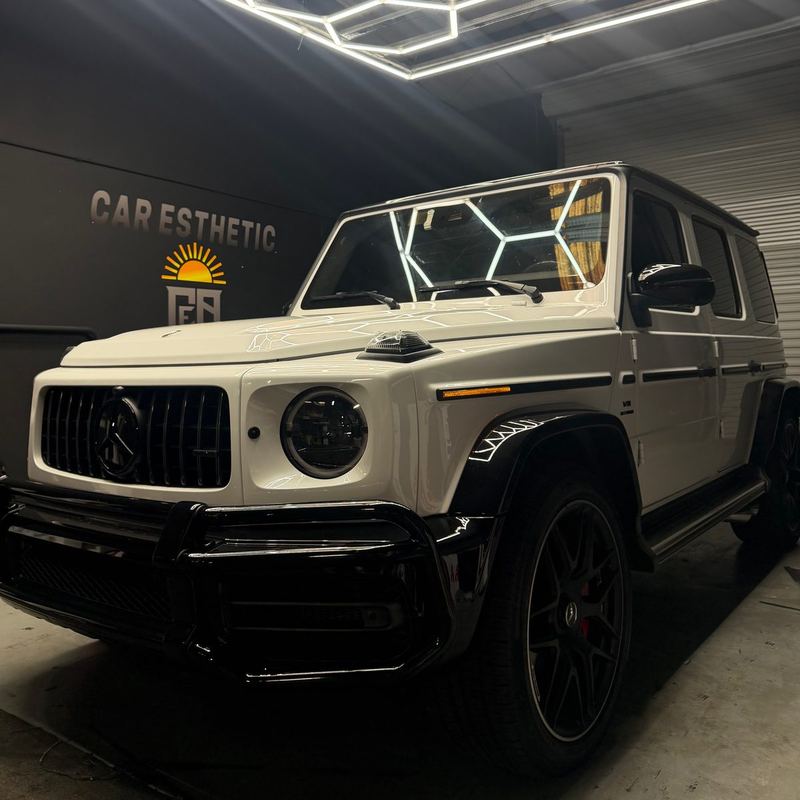 White Mercedes G-Wagon with dark tint in the CEA bay