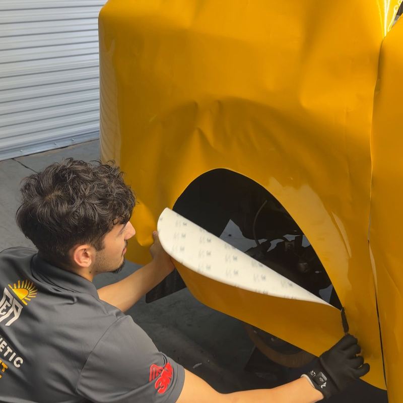 Installing a yellow wrap on a Mitsubishi Outlander